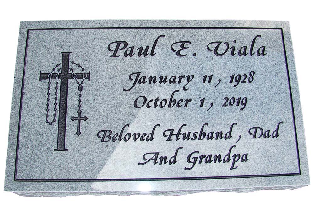 A gravestone for paul e. viala who died on january 11 1928