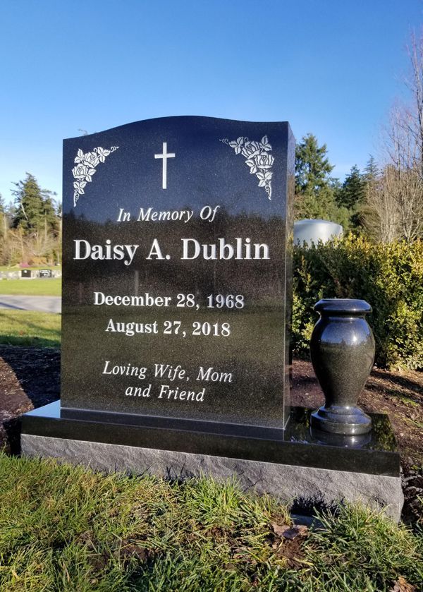 a gravestone for daisy a. dublin is in a cemetery .