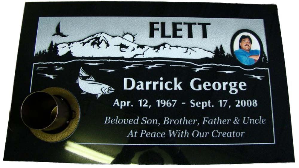 A black grave marker for darrick george from 1967 to 2008