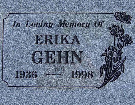 A gravestone for erika gehn with flowers on it.