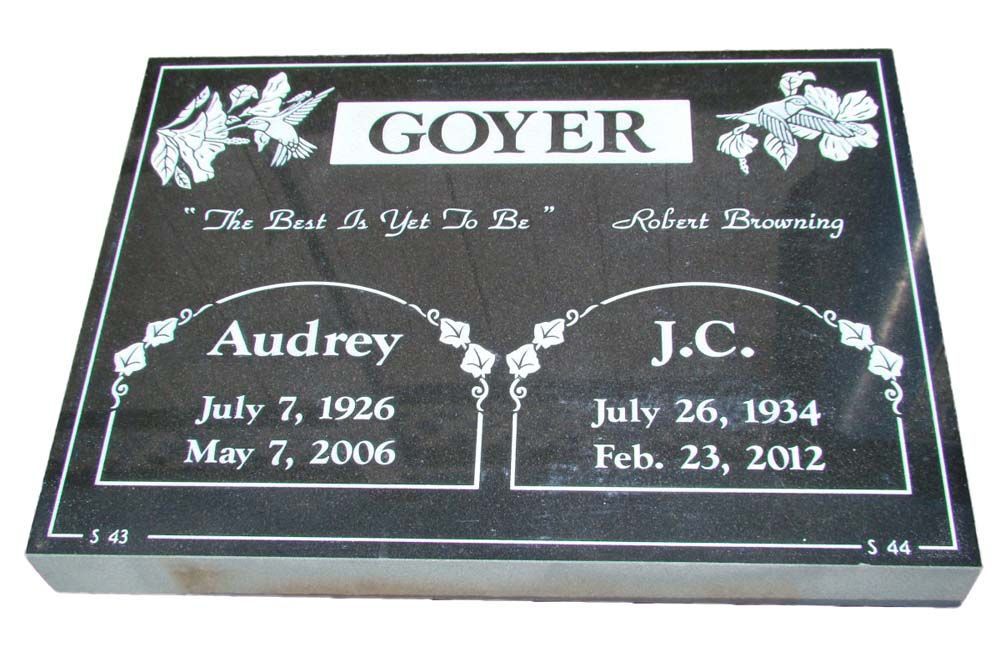 A gravestone for audrey and j.c. goyer