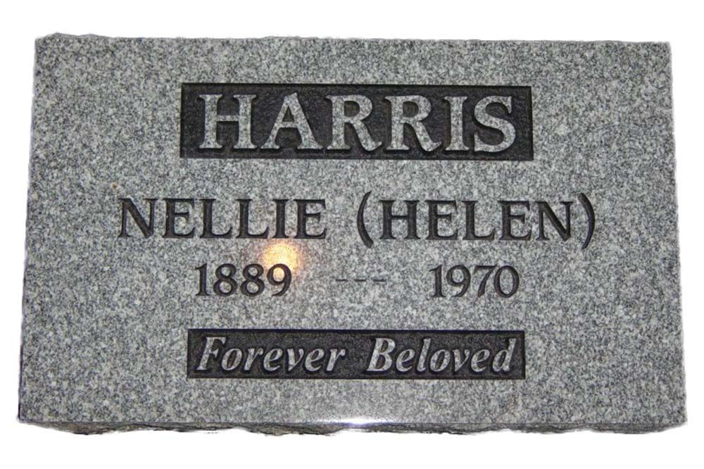 A gravestone for harris nellie helen from 1889 to 1970