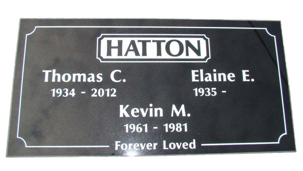 A grave marker for thomas c. hatton and elaine e. hatton