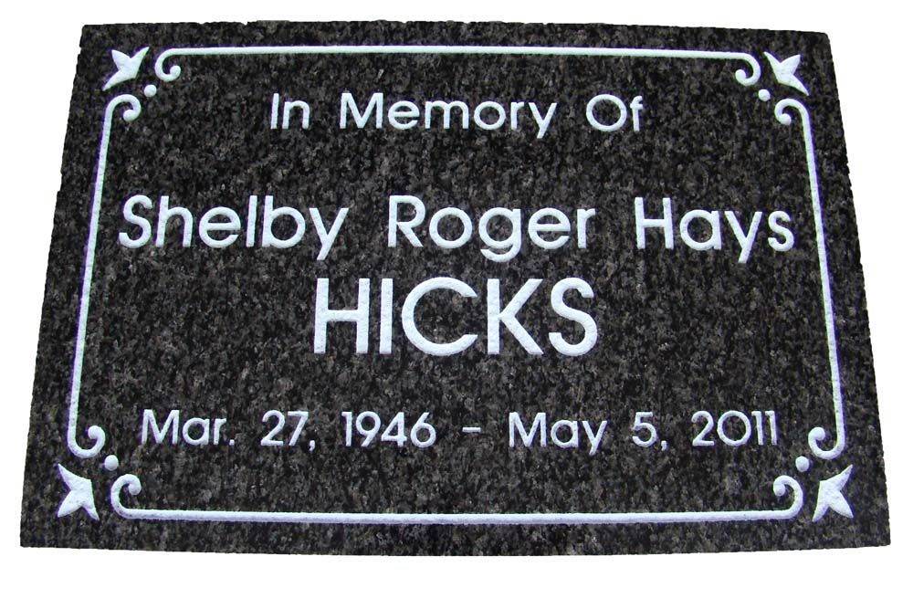 A grave marker for shelby roger hays hicks