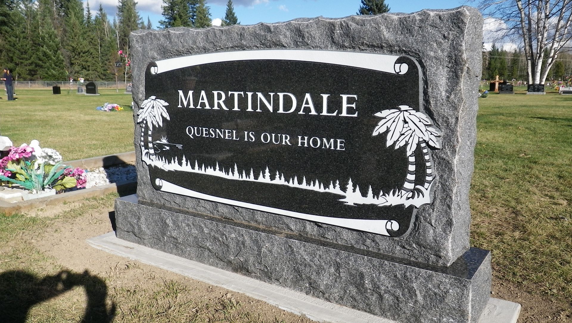 a gravestone in a cemetery with the name martindale written on it