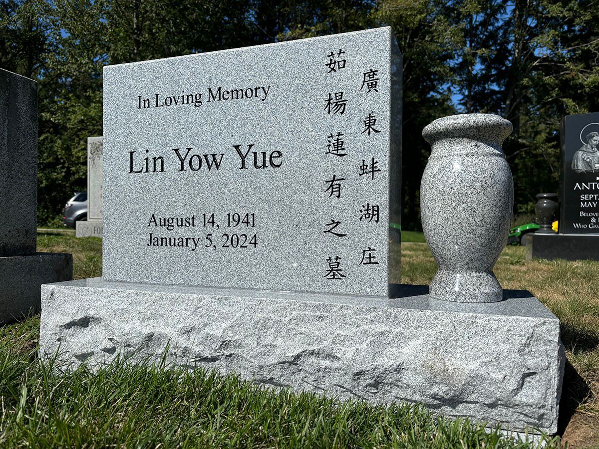 18x24 all polished sera grey granite upright memorial headstone with matching vase and base.