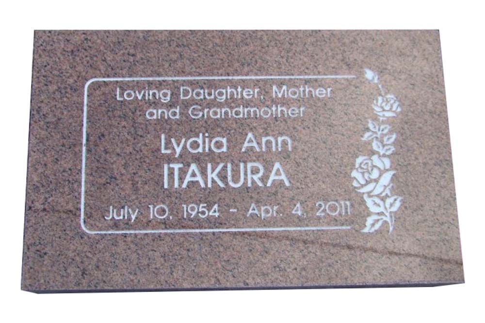 A gravestone for lydia ann itakura who died in 2011