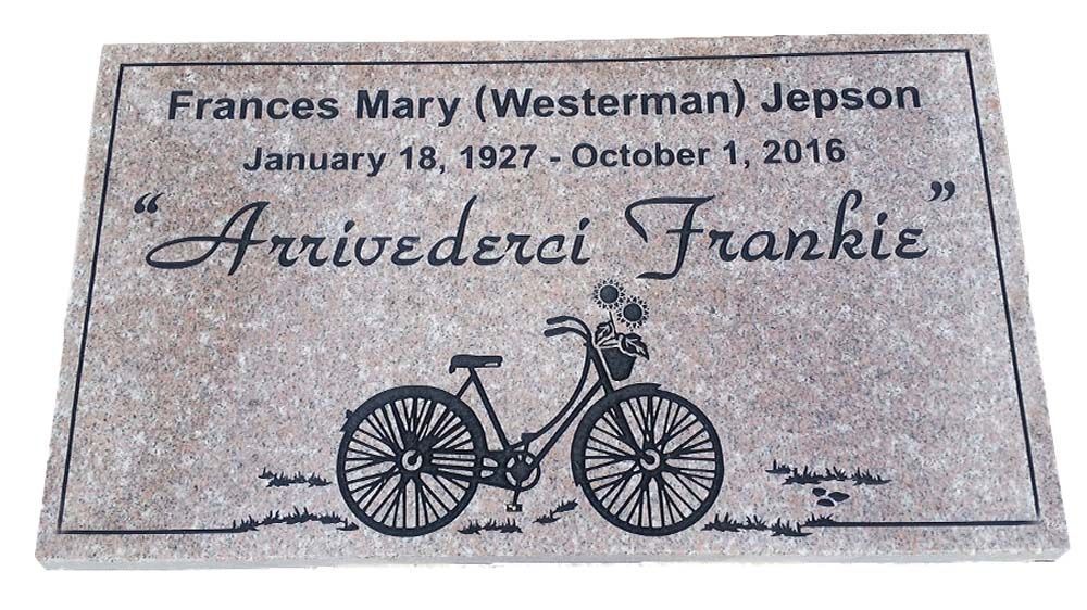 A gravestone for frances mary western jepson with a bicycle on it