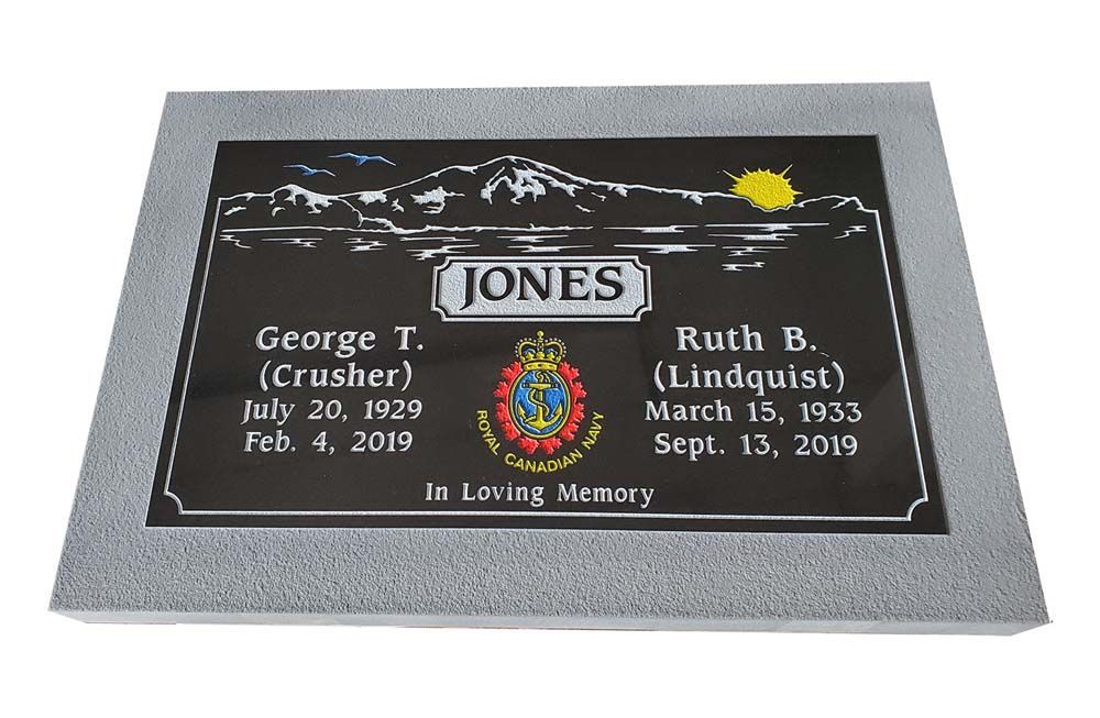 a grave marker for george t. jones and ruth b. lindquist
