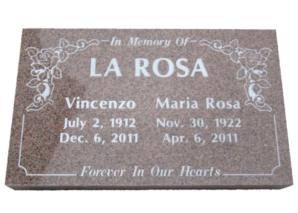 A gravestone with the name la rosa on it