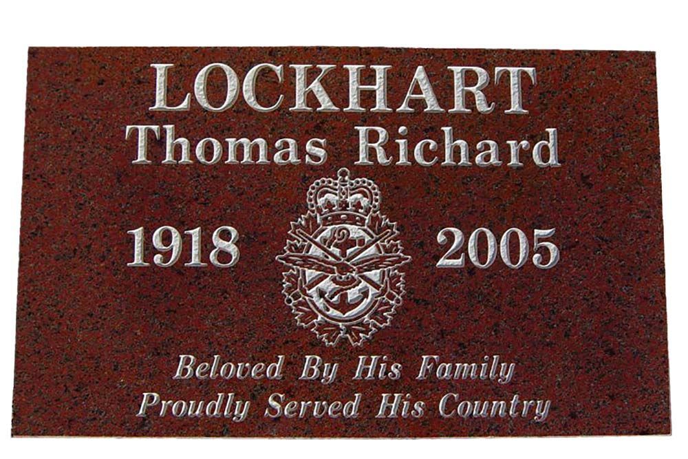 A red plaque with the name lockhart thomas richard on it