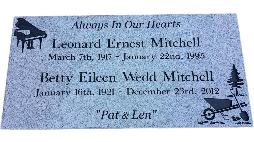 A grave marker for leonard ernest mitchell and betty eileen wedd mitchell