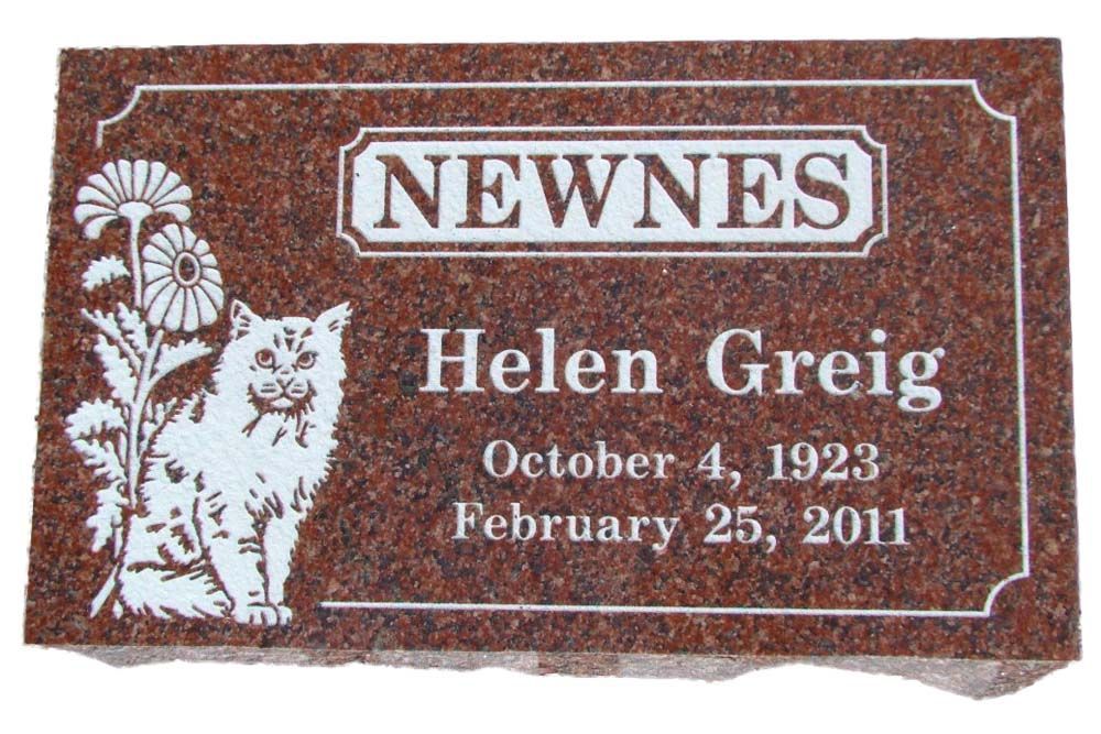 A gravestone for helen greg who died on february 25 2011