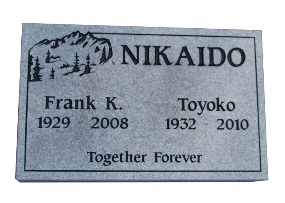 A gravestone for frank k. toyoko and nikaido together forever