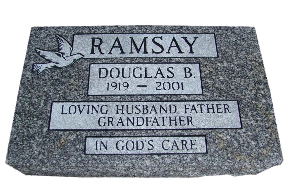 A gravestone for a man named ramsay who died in 2001