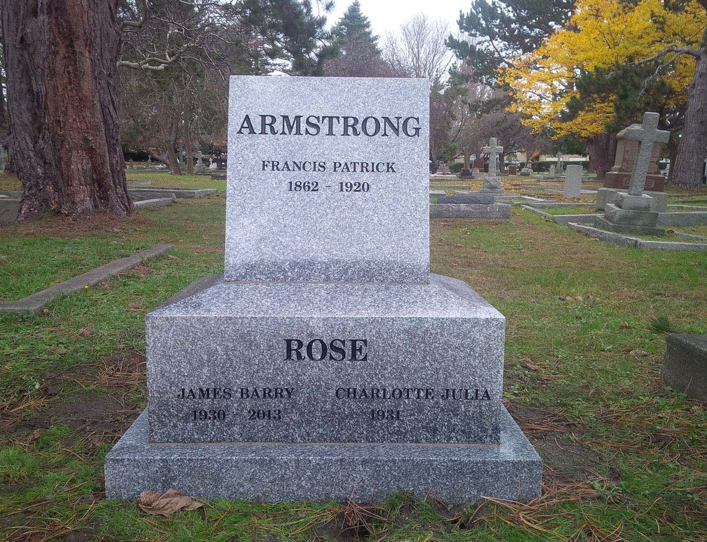 a gravestone for armstrong and rose in a cemetery
