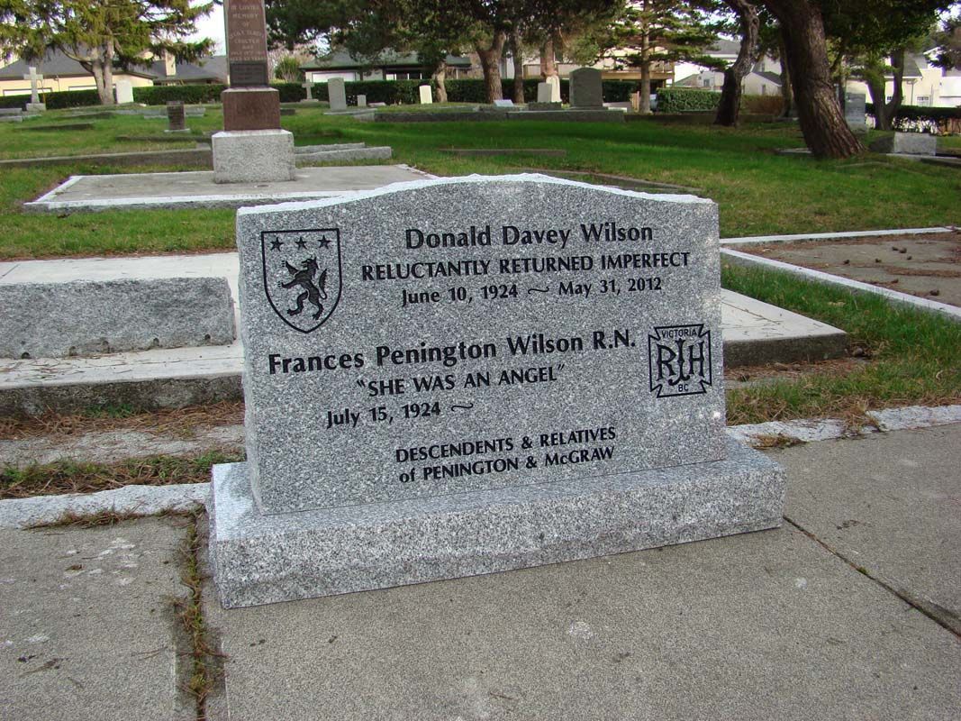 a headstone in a cemetery.
