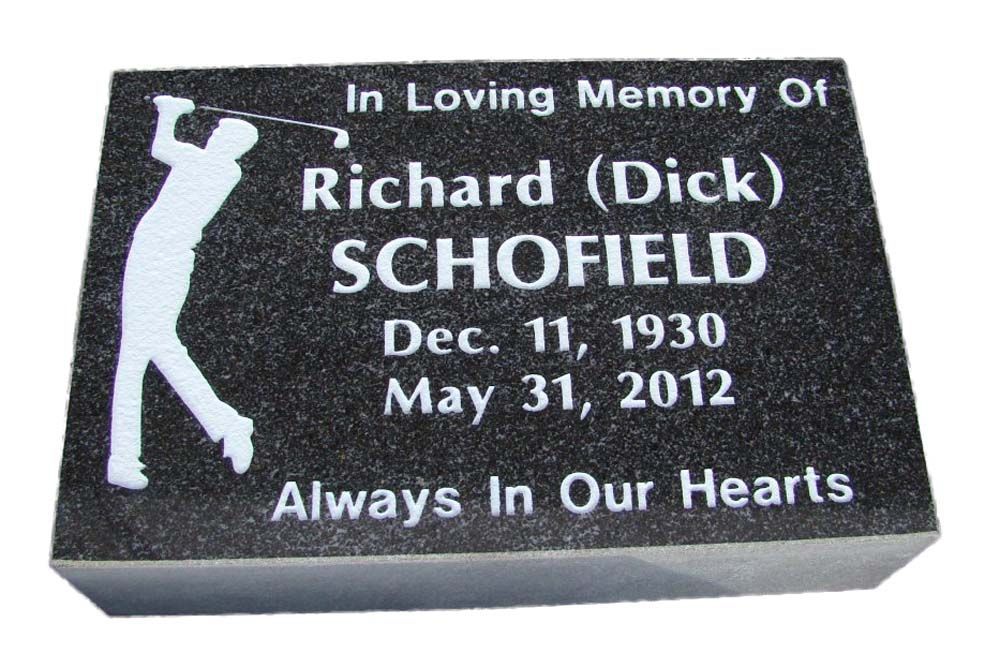 A gravestone for richard schofield who died on may 31 2012