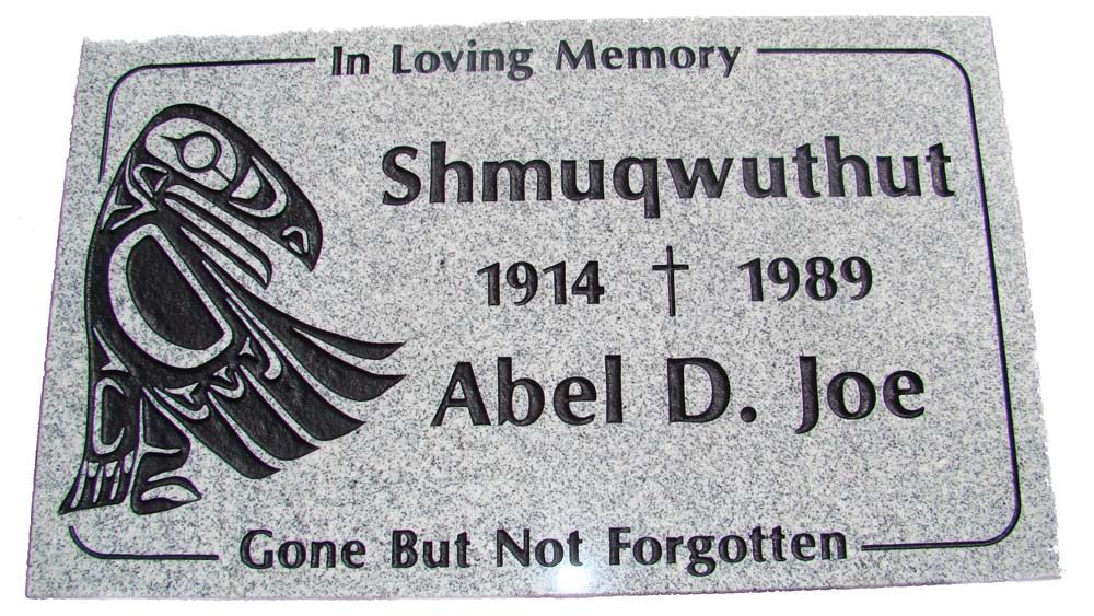 A gravestone for abel d. joe with a bird on it