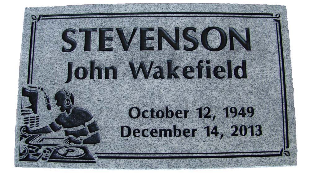 A gravestone for stevenson john wakefield , who died on december 14 , 2013