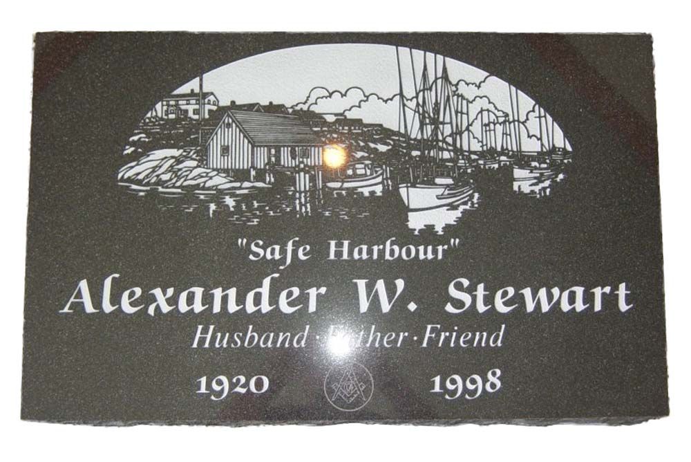 A gravestone for alexander w. stewart who died in 1998
