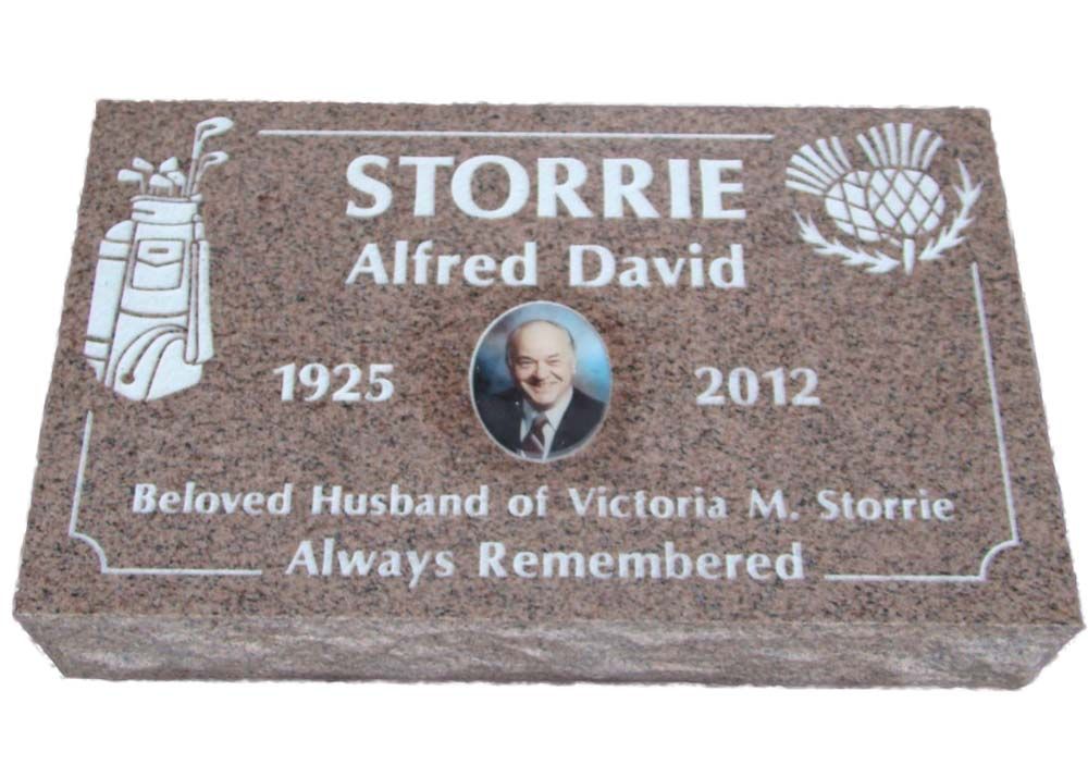 A gravestone for a man named storrie who died in 2012