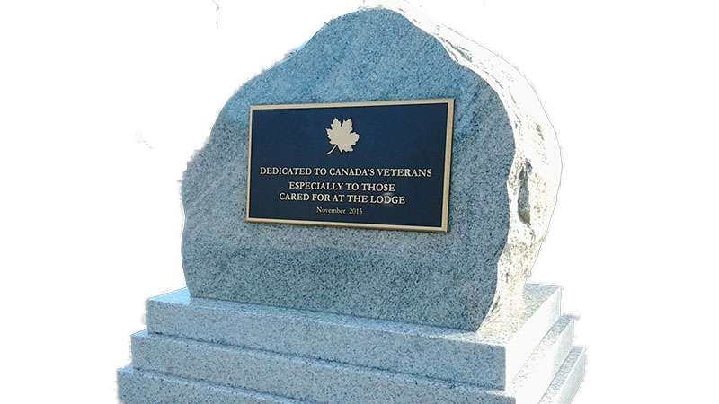Natural grey granite boulder with salute to Canadian Veterans bronze plaque.