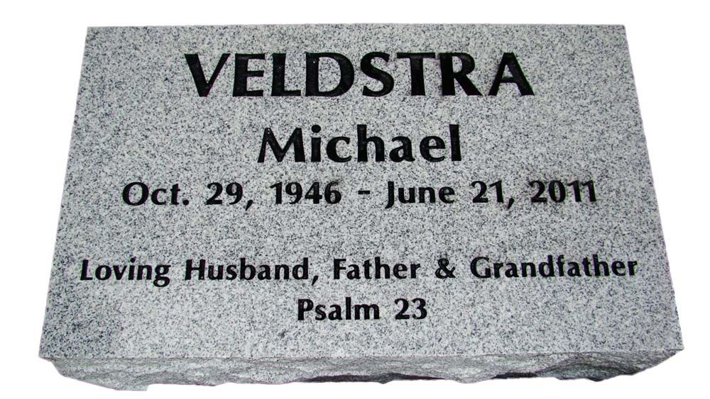 A gravestone for michael veldstra who died on june 21 2011