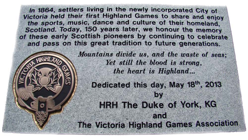 A plaque commemorates the duke of york and the victoria highland games association