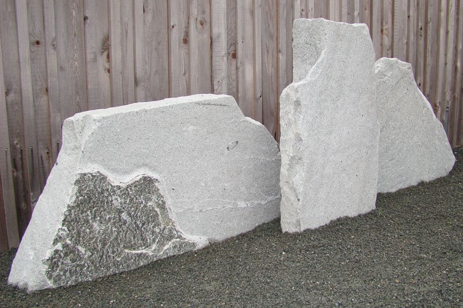 Samples of natural granite boulders/slabs rough cut direct from the quarry prior to engraving.