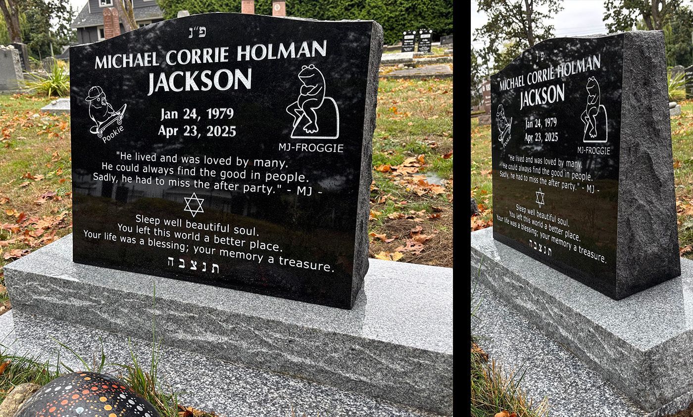black tapered headstone with Jewish / Hebrew lettering and custom graphics