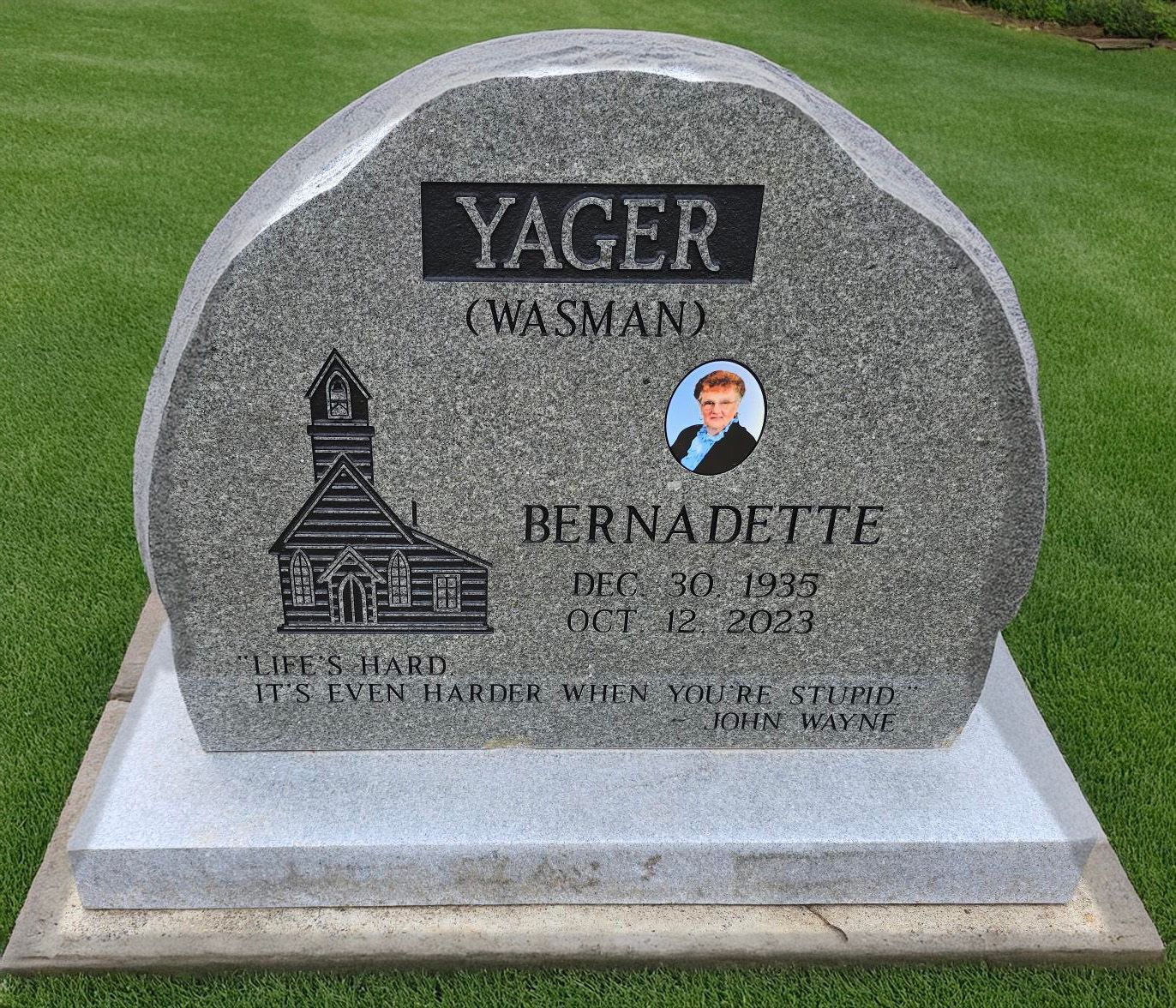 grey granite boulder headstone with photo plaque
