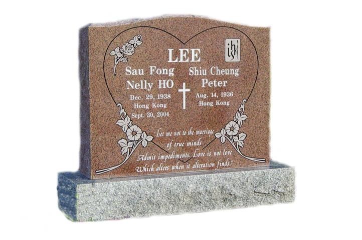 a gravestone with a heart shaped design and the name lee on it .