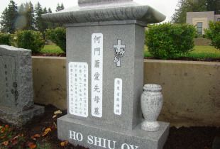 a gravestone for ho shiu oy in a cemetery