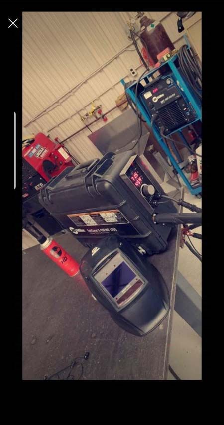 A picture of a welding machine and a welding mask