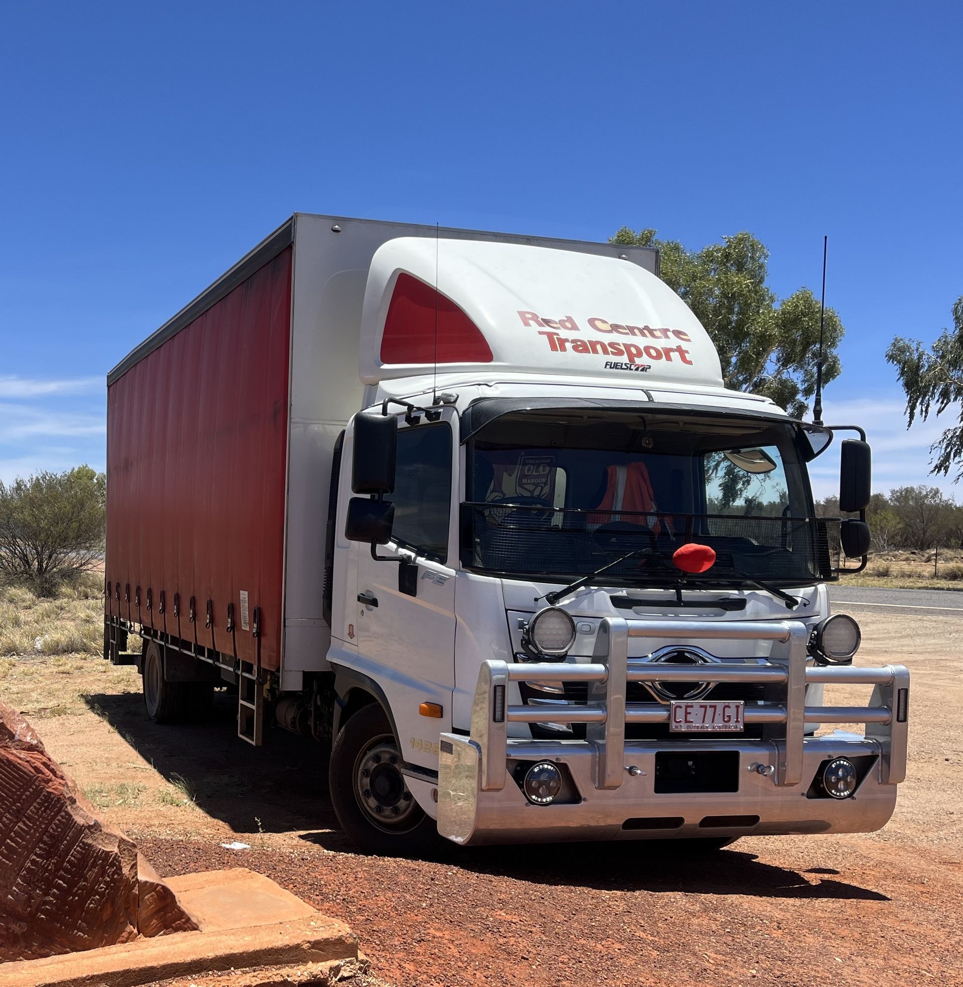Worker in a Hard Hat and Safety Vest Standing — Red Centre Transport in Braitling, NT