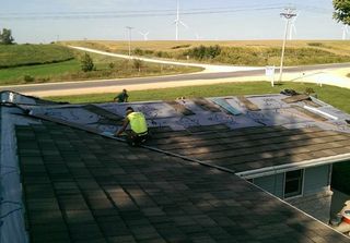 Workers Repairing Roof — Elk Horn, IA — Modern Roofing LLC