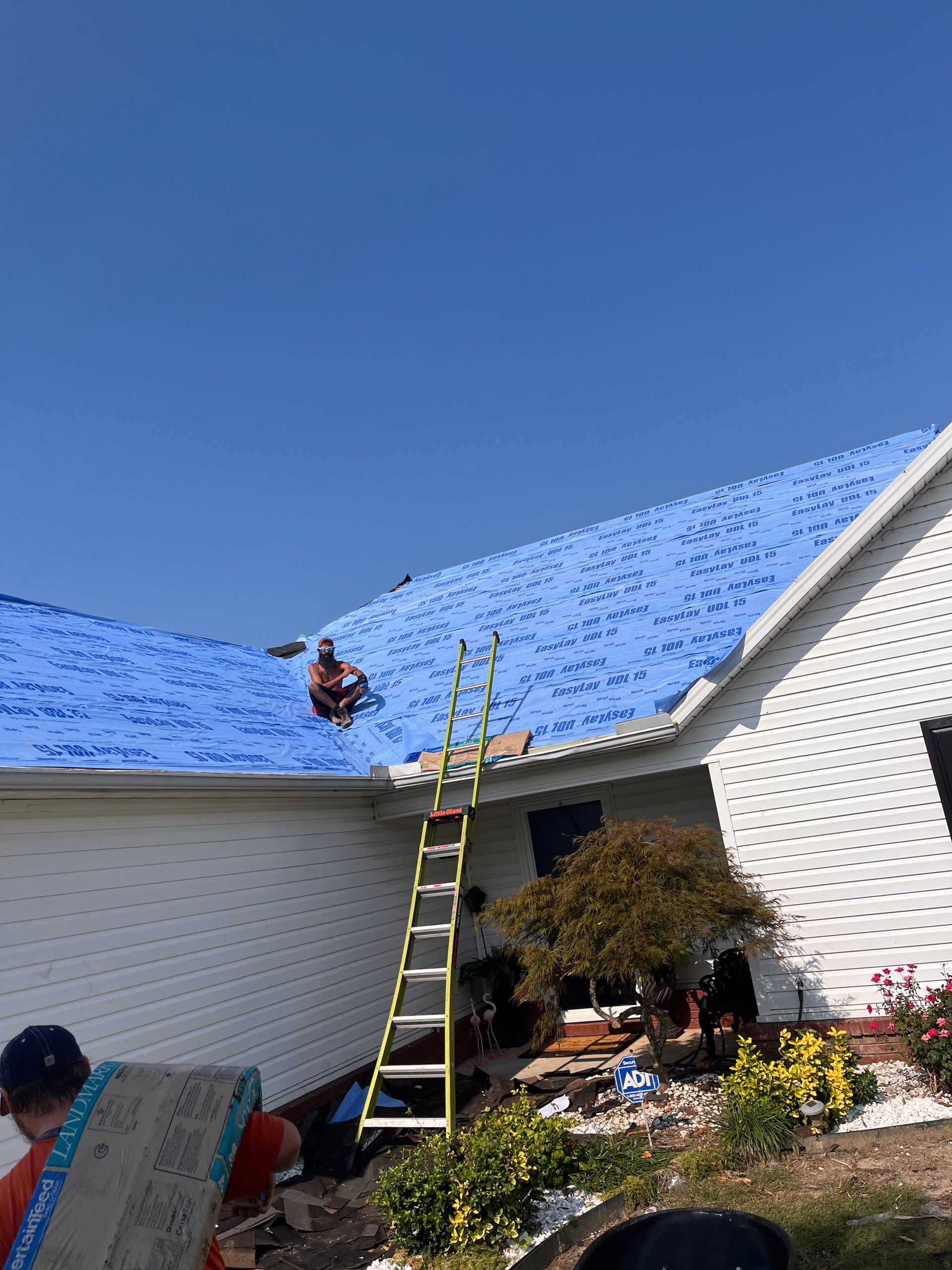 tarps on roof for repairs