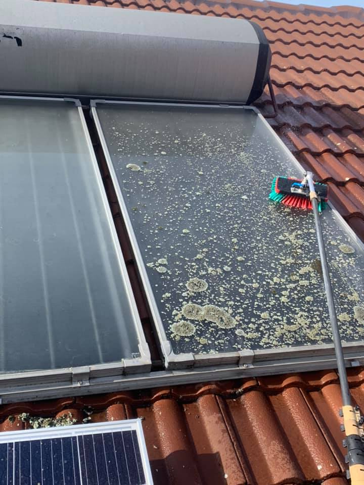 solar panel cleaning in progress