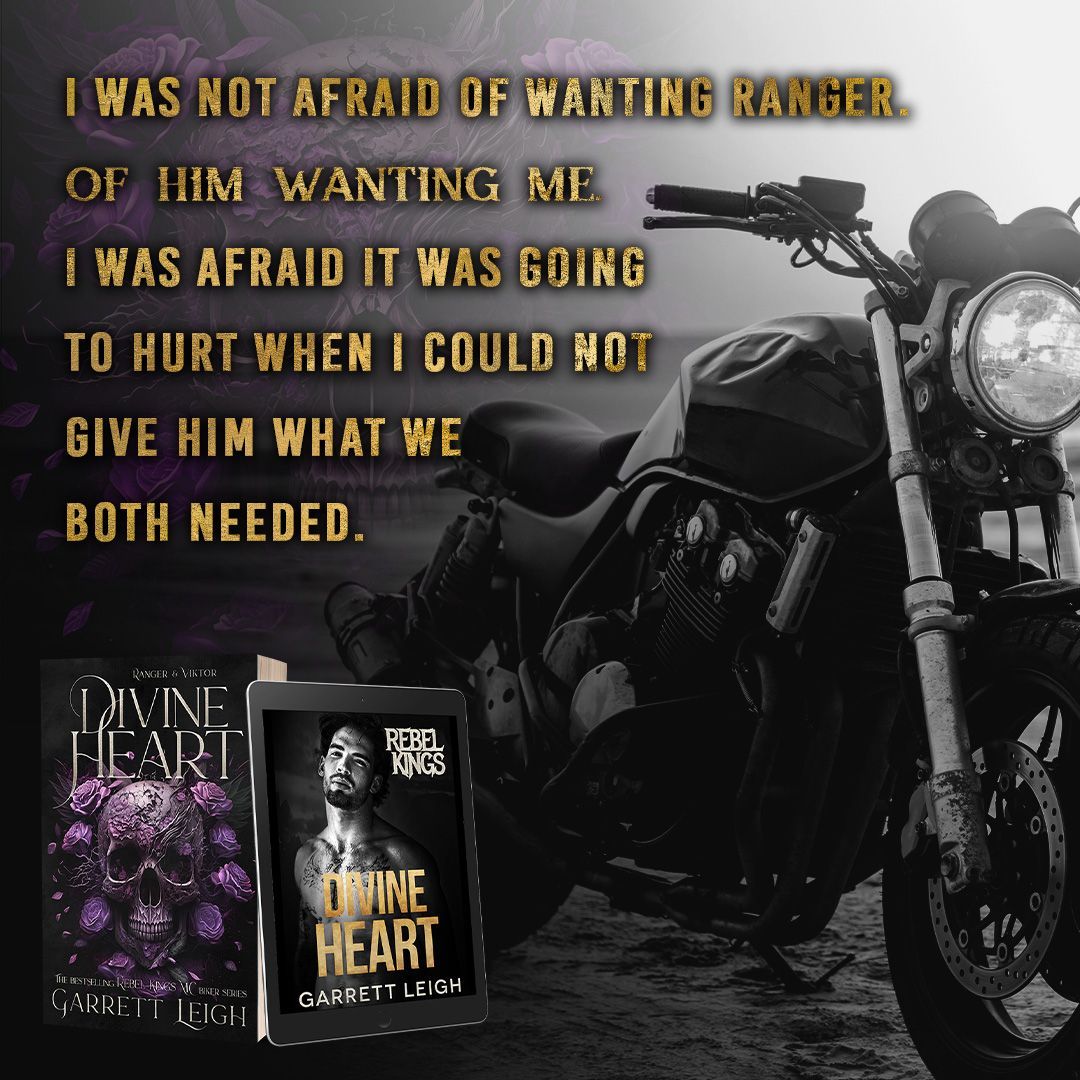 A motorcycle is parked next to a book titled Divine Heart by Garrett Leigh.