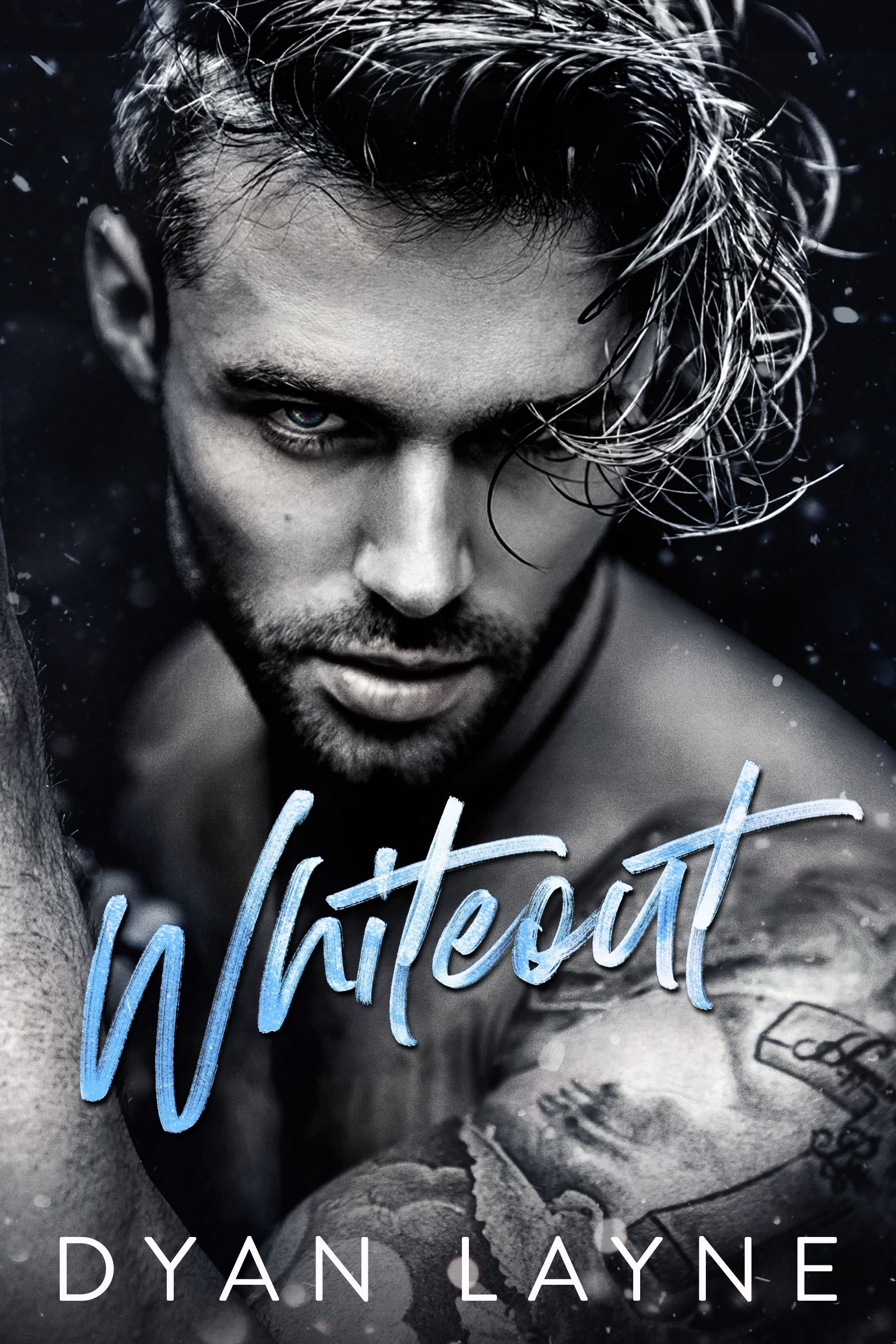 A man with a tattoo on his arm is on the cover of a book called whiteout by dyan layne