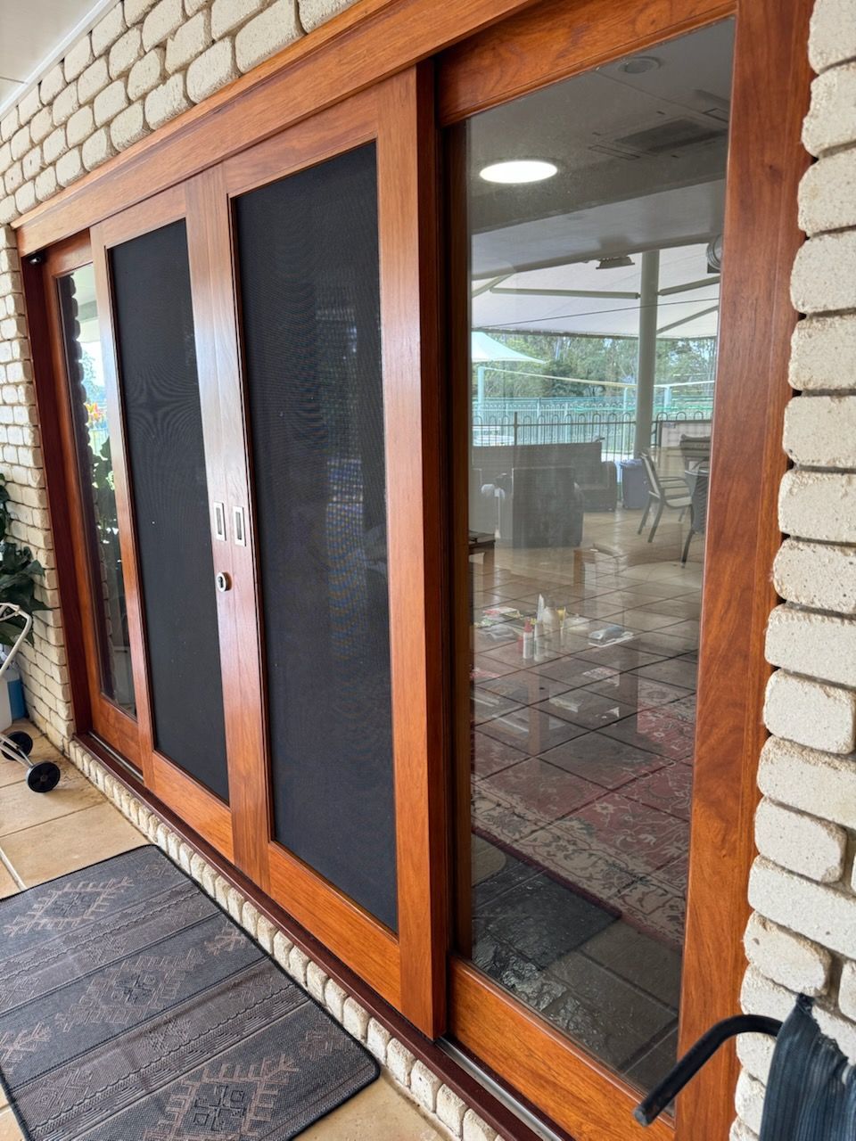 Wood-framed sliding glass doors -Painter In Sunshine Coast, QLD