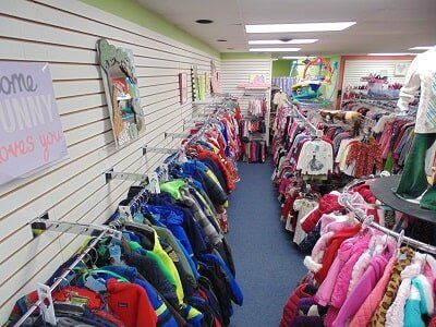 Mother Buying Clothes for her children — Kids Consignment in Louisville, KY