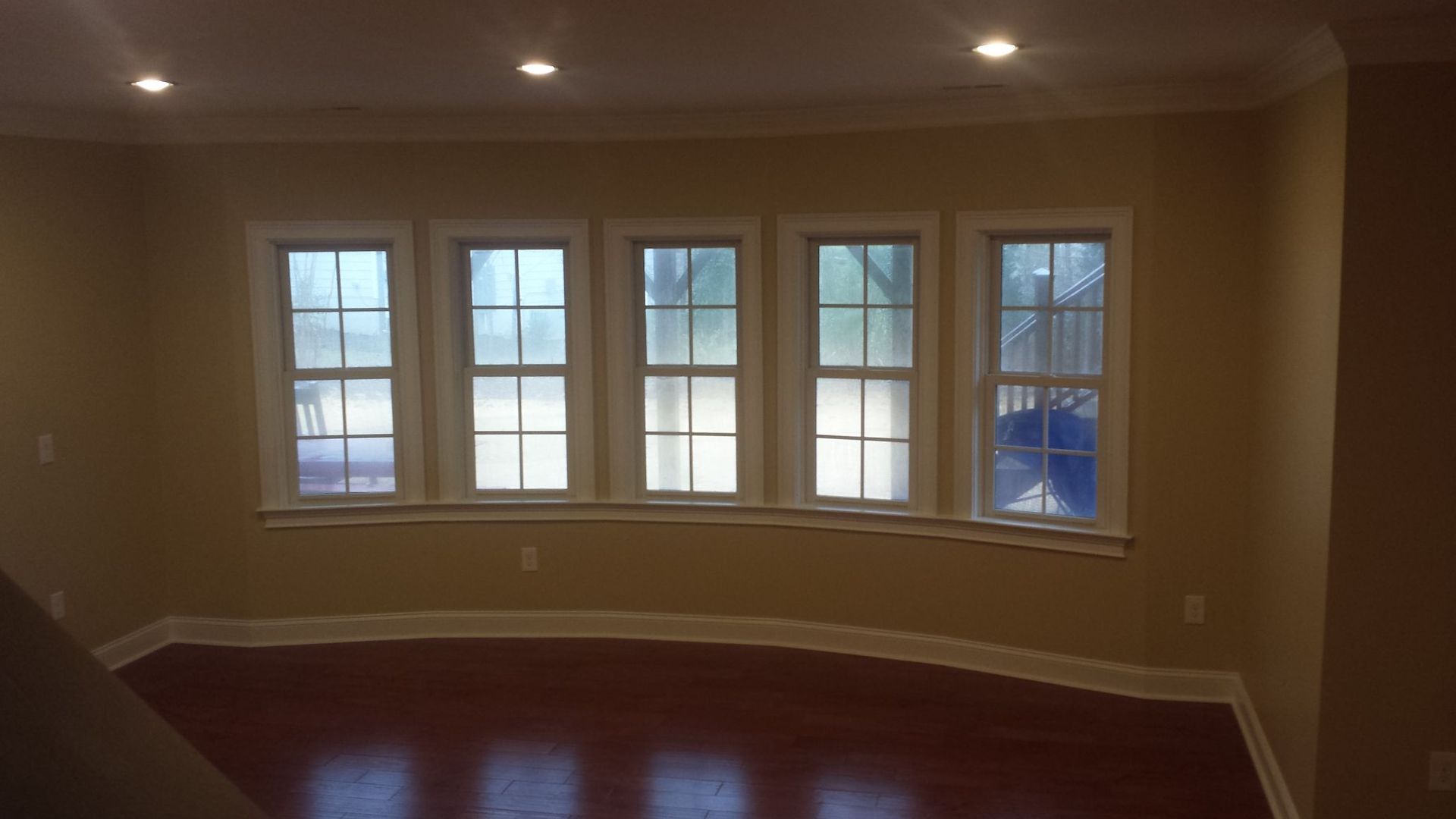 a room with a lot of windows on the wall