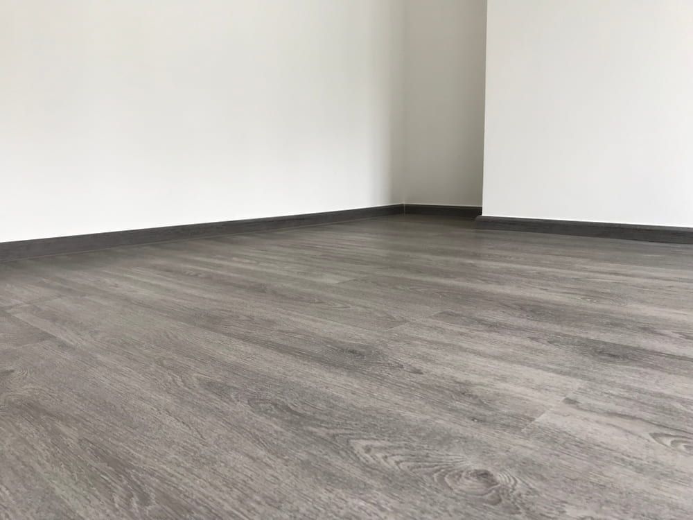An Empty Room with A Wooden Floor — More on the Floor in Barrack Heights, NSW