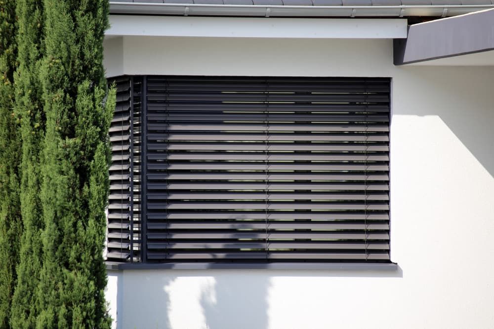 A Window with A Black Blind on It — More on the Floor in Barrack Heights, NSW