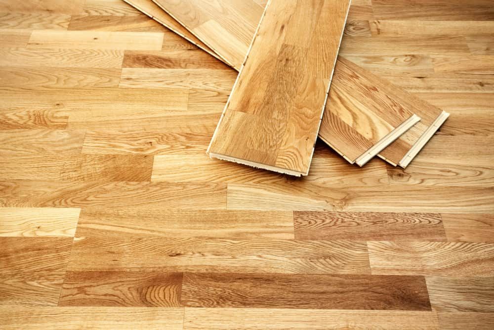 A Stack of Wooden Flooring Boards on A Wooden Floor — More on the Floor in Barrack Heights, NSW