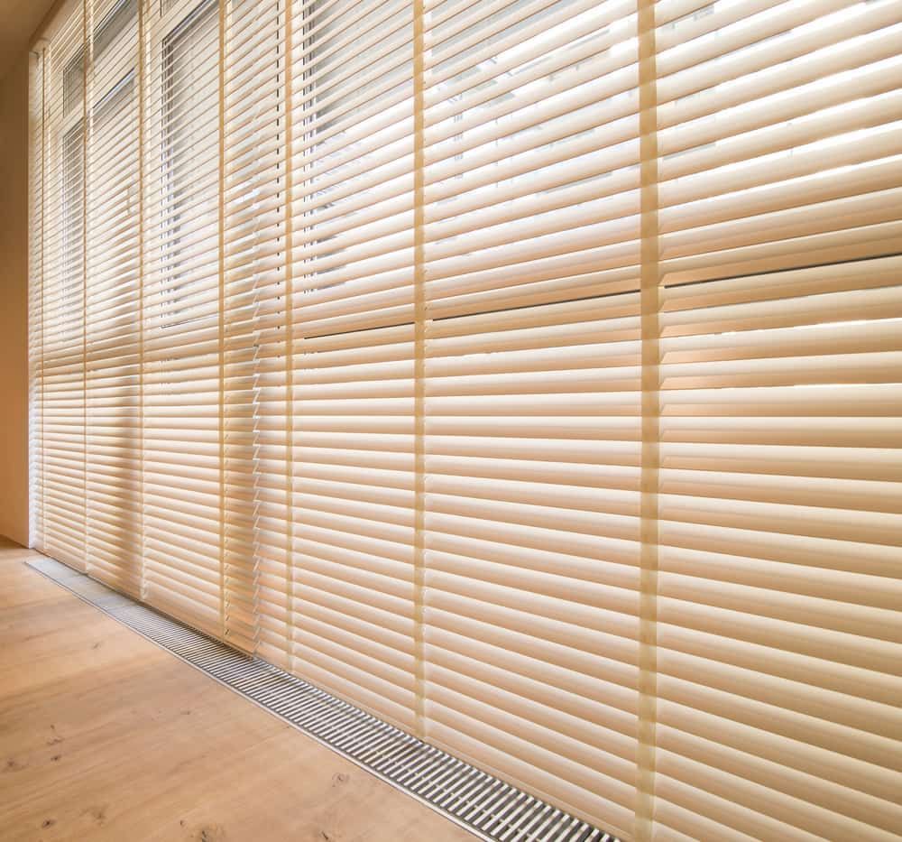 A Large Window with Blinds on It — More on the Floor in Dapto, NSW