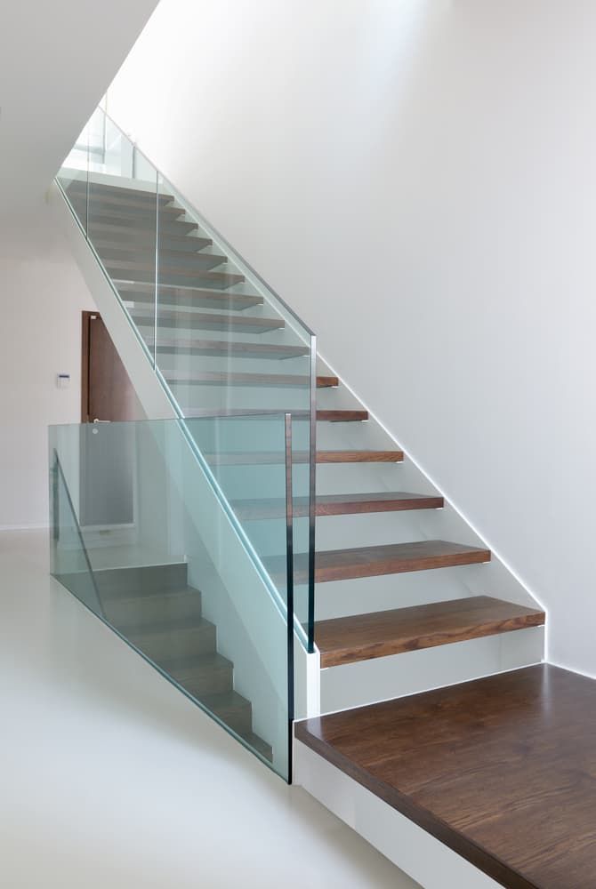 A Modern Staircase with A Glass Railing — More on the Floor in Barrack Heights, NSW