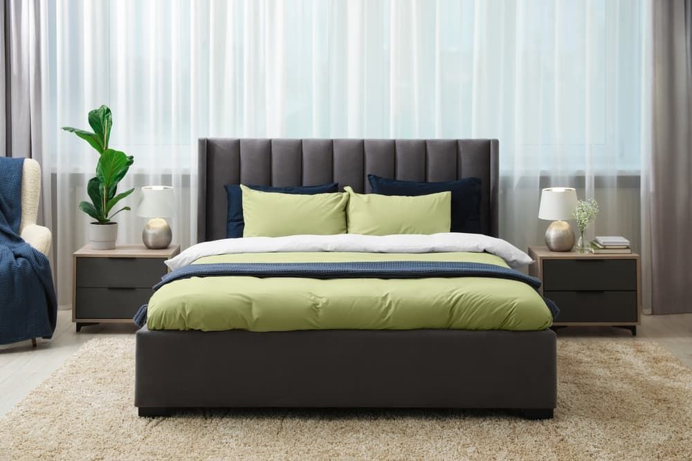 A Bedroom with A Bed and A Window — More on the Floor in Kiama, NSW